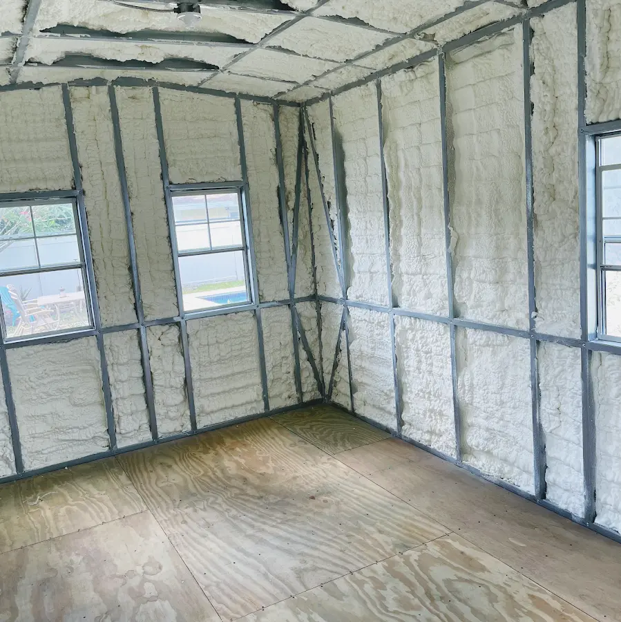 Closed-cell spray foam insulation applied to wall cavities in a residential project in Henderson